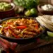 Easy Oven-Baked Chicken Fajitas (One Pan, 55 Min) - Thefoodiebunch Oven-Baked Chicken Fajitas