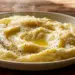 Super Creamy Mashed Potatoes - Thefoodiebunch Creamy Mashed Potatoes Topped With Melted Butter, Black Pepper, And Grated Pecorino Romano In A White Bowl