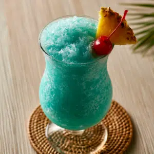 Tropical Blue Hawaiian Cocktail: A Taste Of Paradise - Thefoodiebunch Blue Hawaiian Cocktail Creamy Frozen Tropical Rum Drink